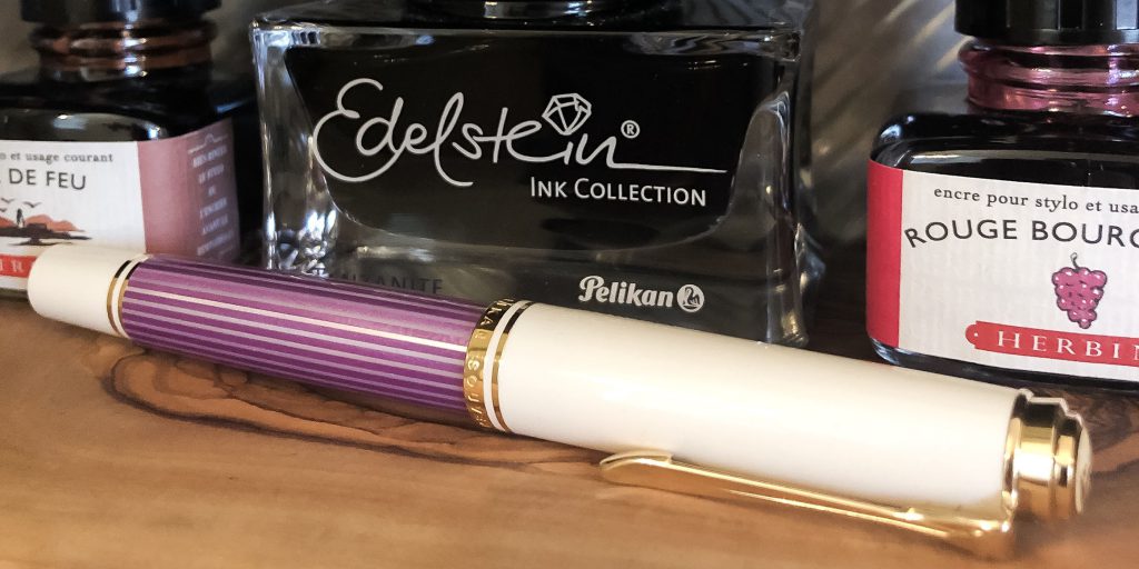 Did you hear about the 2022 material changes to the Pelikan Souveran pens? // Featured in image: Pelikan Souveran M600 Violet White fountain pen. 