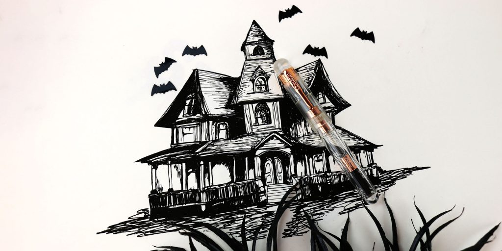 2023 Top 10 Halloween Pens: Conklin All American Demo with rose gold trim fountain pen for the Haunted Mansion category