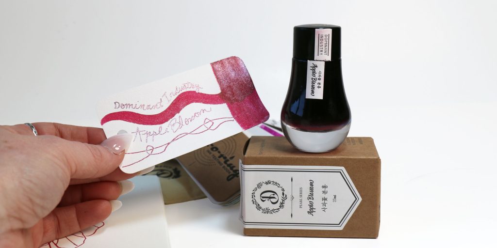 Dominant Industry Apple Blossom ink is a Magenta Pink in with loads of silver shimmer.