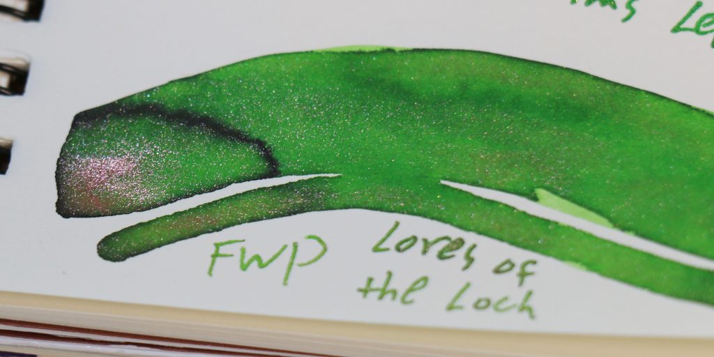 Close-up of Ferris Wheel Press Lores of the Loch green ink with gold shimmer