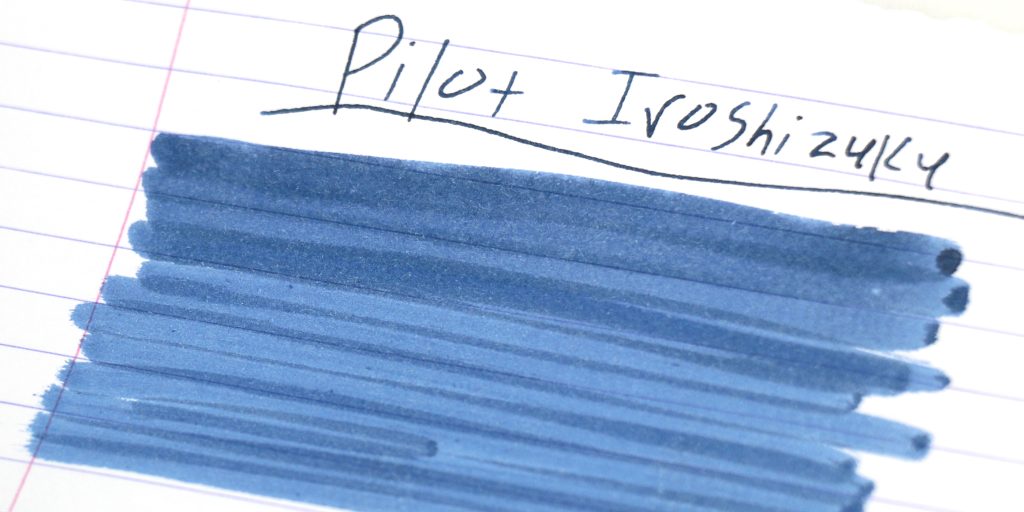 Close-up swatch of Pilot Iroshizuku Shin-Kai ink showing smoky blue hue
