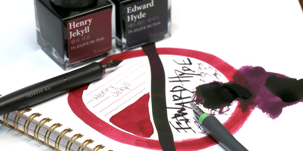 Closeup of Henry Jekyll and Edward Hyde fountain pen inks from Wearingeul with ink swatches and Sailor Compass Hocoro dip pens.