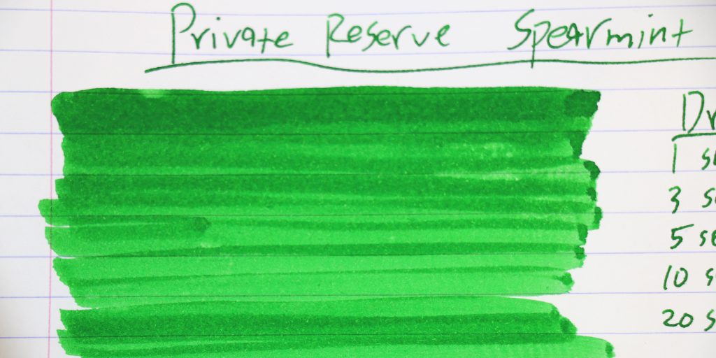 Large ink swatch of Private Reserve Spearmint ink showing vivid green hue with handwritten label.