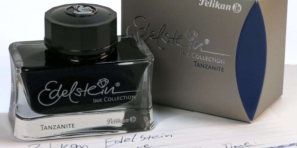 Close-up of Pelikan Edelstein Tanzanite ink bottle with packaging