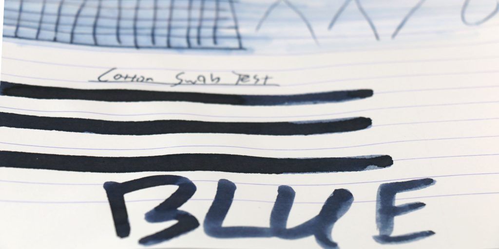 Pelikan Edelstein Tanzanite ink cotton swab test showing rich blue-black tones