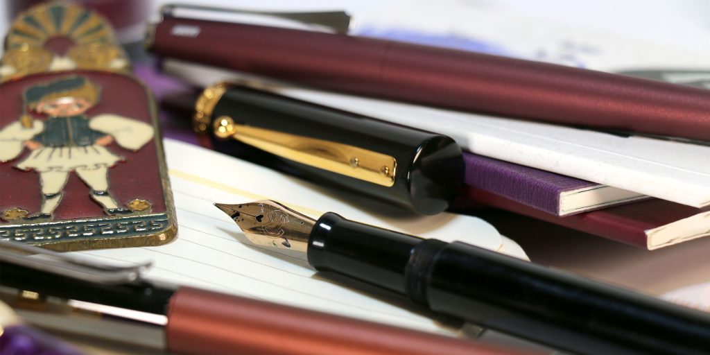 Enchanted Relics Collection in Pen Chalet's 2025 Top Halloween Pens and Inks List showing the Mag 600's flex nib