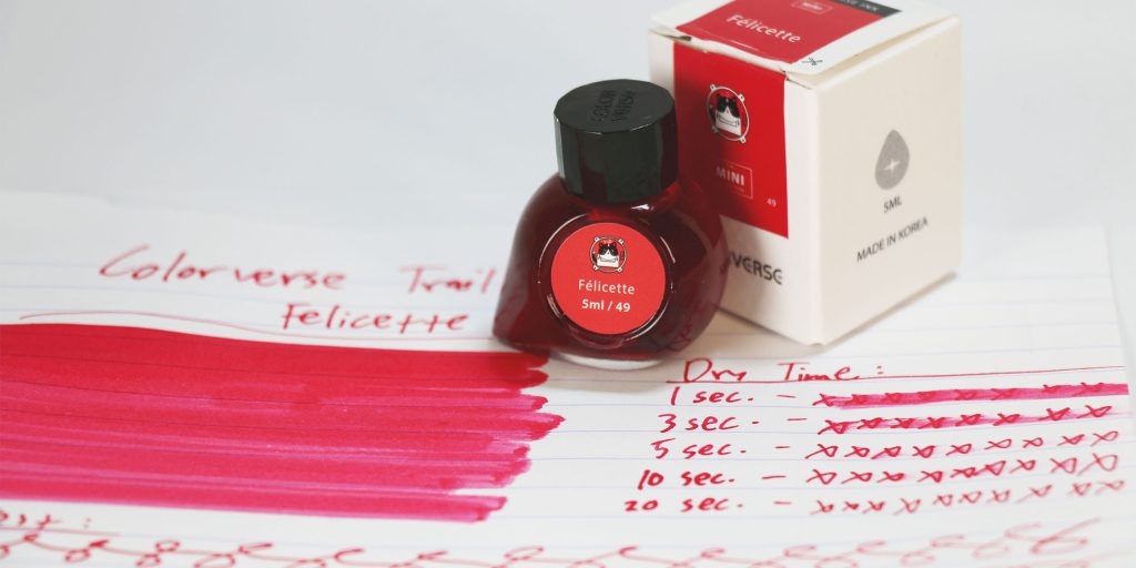 The Colorverse Felicette 5ml Mini ink bottle and additional box packaging sitting on the ink review test sheet.