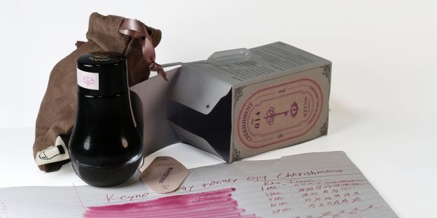 Keyno 014 Cherishment ink review with bottle, packaging, pipette, dust bag, and pink ink test results