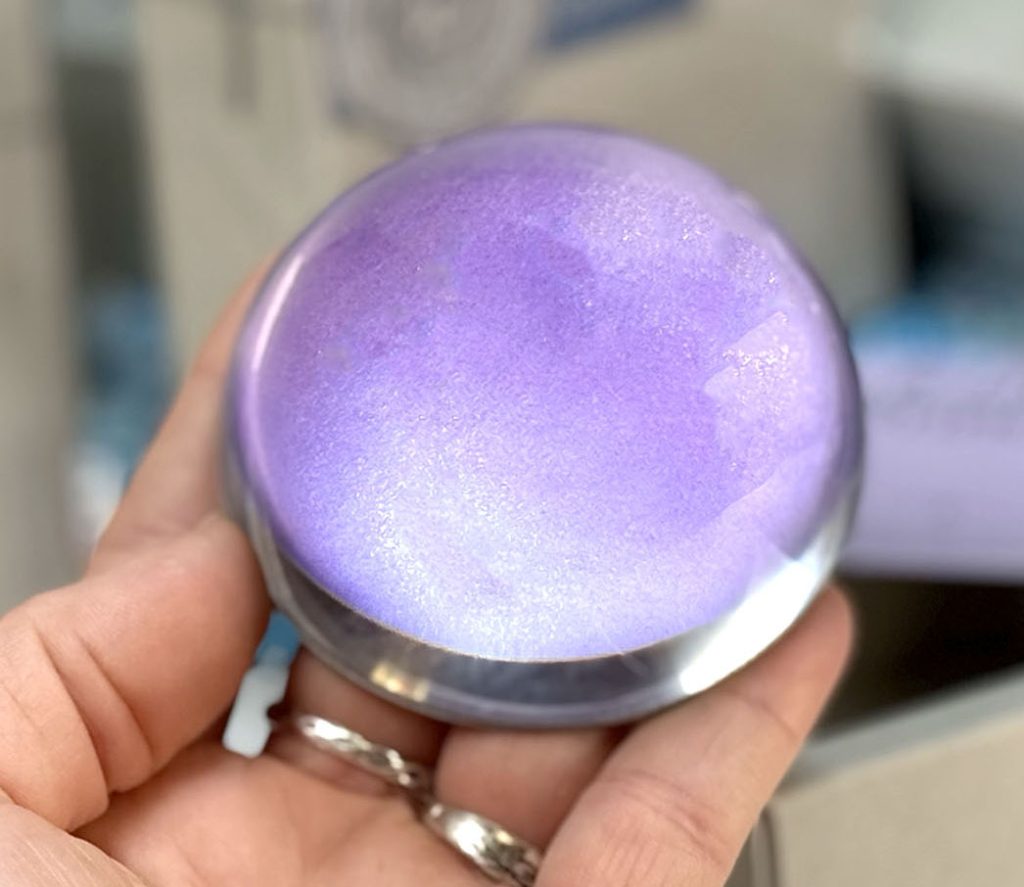 Wearingeul Crystal Ink Paperweight in Little Princess with a shimmering purple and blue glass-like finish.