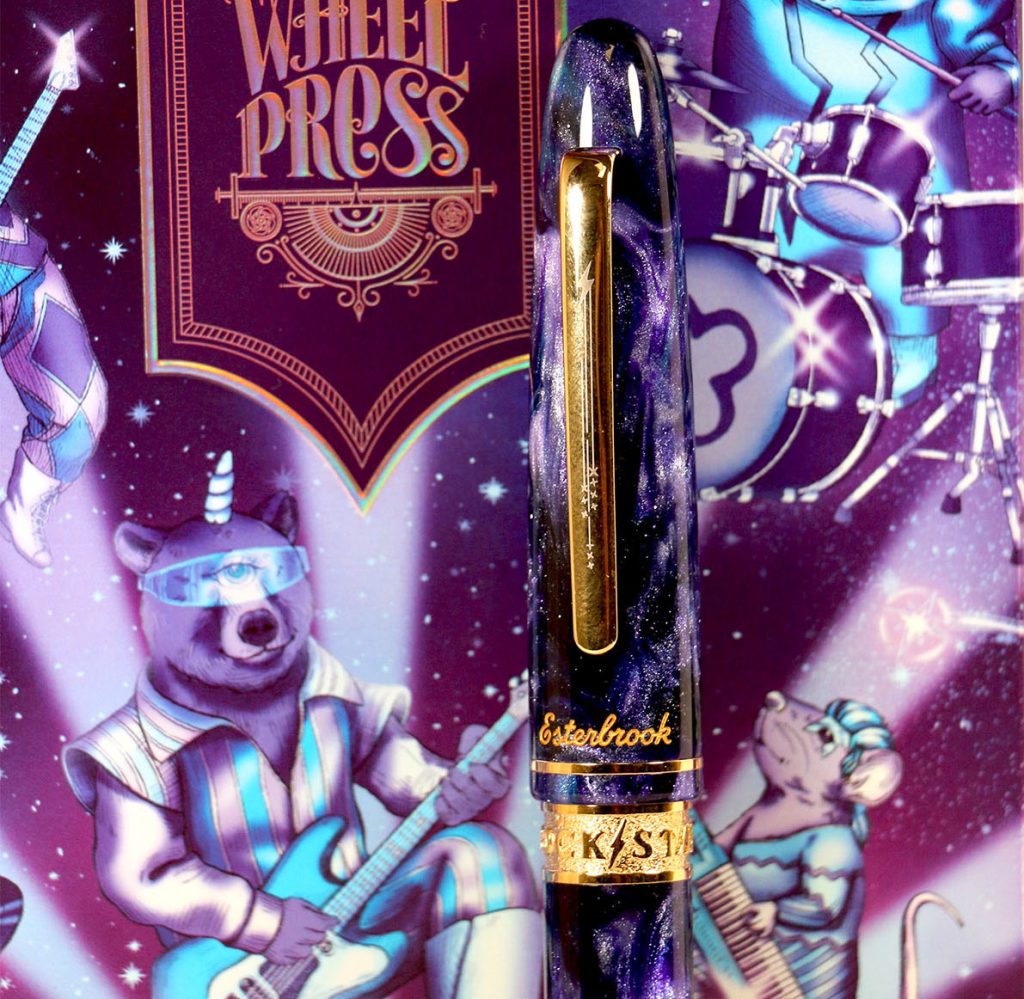 closeup of the Esterbrook x FerriTales Rockstar Estie fountain pen showing the cap and pen clip and center ring against the themed custom box packaging. 