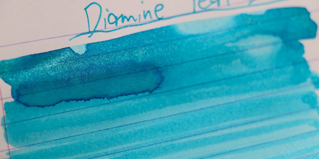 Diamine Let It Snow turquoise ink swatch with icy blue silver chameleon shimmer