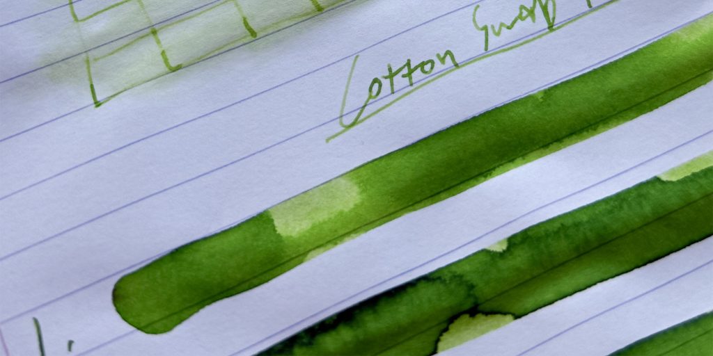 Three saturated Appletini green ink swatches showing darker pooled edges and lighter yellow-green areas.