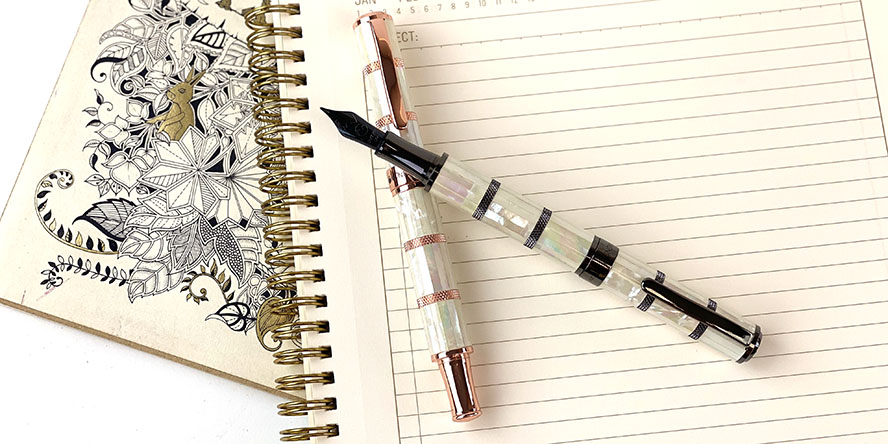 monteverde_regatta_mother_of_pearl_limited_edition_fountain_pens_on_notebook