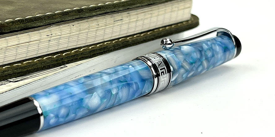 aurora_optima_365_celeste_blue_fountain_pen_from_side