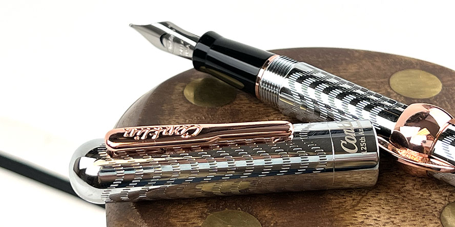 conklin_mark_twain_crescent_filler_125th_anniversary_chrome_chase_fountain_pen_with_rose_gold_trim_CLOSE