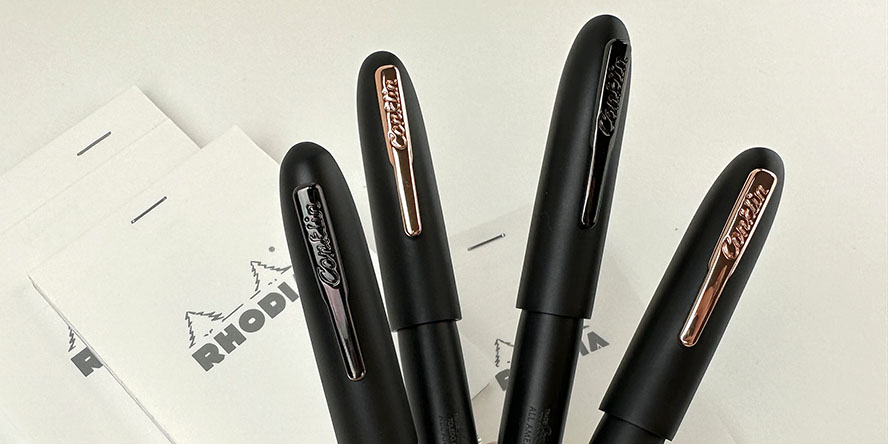 conklin_limited_edition_all_american_matte_black_rollerball_pens_in_hand