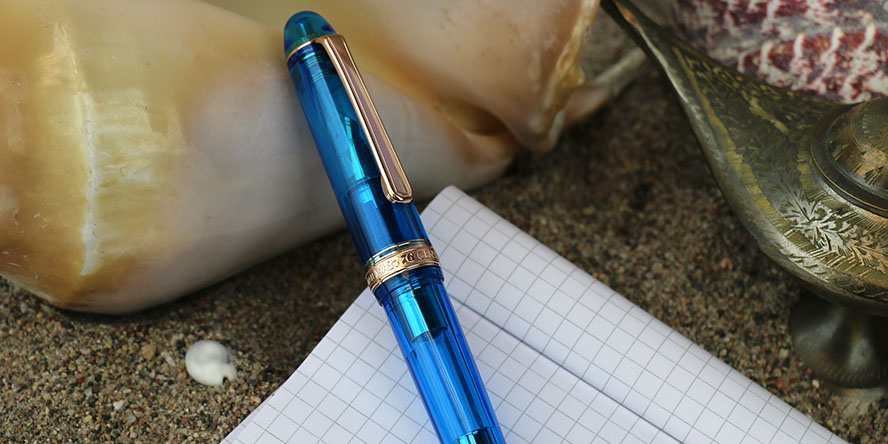 platinum_3776_sands_of_komodo_fountain_pens_capped_on_notebook